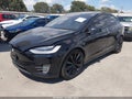 2020 Tesla Model X — photo 2 of 22 | VIN 5YJXCDE24LF272211