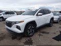 2022 Hyundai Tucson — photo 2 of 17 | VIN 5NMJCCAE8NH136570