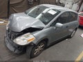 2011 Nissan Versa — photo 2 of 16 | VIN 3N1BC1CP0BL411096