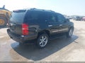 2009 Chevrolet Tahoe — photo 4 of 16 | VIN 1GNFK33049R206357