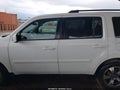 2015 Honda Pilot — photo 14 of 16 | VIN 5FNYF3H35FB031188