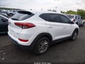 2018 Hyundai Tucson — photo 4 of 11 | VIN KM8J2CA42JU750054
