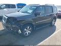 2012 Honda Pilot — photo 2 of 16 | VIN 5FNYF3H98CB017446