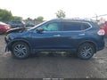 2015 Nissan Rogue — photo 14 of 16 | VIN 5N1AT2MV0FC906830