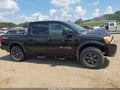 2013 Nissan Titan — photo 14 of 17 | VIN 1N6BA0ECXDN306010