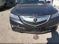 2015 Acura TLX — photo 6 of 16 | VIN 19UUB3F71FA010011