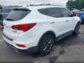 2018 Hyundai Santa Fe — photo 4 of 18 | VIN 5XYZWDLA3JG525230