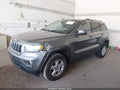 2012 Jeep Grand Cherokee — photo 2 of 11 | VIN 1C4RJFAG1CC233794
