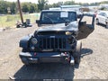 2014 Jeep Wrangler — photo 11 of 15 | VIN 1C4BJWCG4EL215498