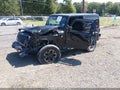 2014 Jeep Wrangler — photo 2 of 15 | VIN 1C4BJWCG4EL215498