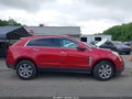 2016 Cadillac SRX — photo 13 of 16 | VIN 3GYFNBE37GS553302