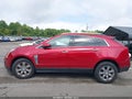 2016 Cadillac SRX — photo 14 of 16 | VIN 3GYFNBE37GS553302