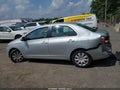2009 Toyota Yaris — photo 14 of 16 | VIN JTDBT903291309913