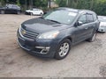 2014 Chevrolet Traverse — photo 2 of 11 | VIN 1GNKVHKD2EJ101381