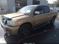 2005 Nissan Titan — photo 2 of 13 | VIN 1N6AA07AX5N506572