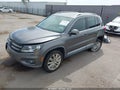 2014 Volkswagen Tiguan — photo 2 of 19 | VIN WVGAV3AX9EW545925