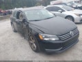 2014 Volkswagen Passat — photo 1 of 16 | VIN 1VWBS7A33EC064895