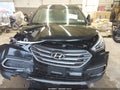 2018 Hyundai Santa Fe — photo 12 of 16 | VIN 5XYZTDLB8JG551419