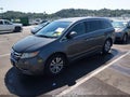 2014 Honda Odyssey — photo 2 of 17 | VIN 5FNRL5H49EB069555