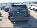 2014 Jeep Compass — photo 16 of 16 | VIN 1C4NJCBBXED825904