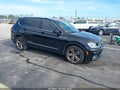 2018 Volkswagen Tiguan — photo 1 of 16 | VIN 3VV3B7AX5JM195931