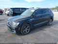 2018 Volkswagen Tiguan — photo 2 of 16 | VIN 3VV3B7AX5JM195931