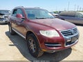 2009 Volkswagen Touareg — photo 1 of 15 | VIN WVGBE77L39D003950