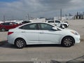 2016 Hyundai Accent — photo 13 of 16 | VIN KMHCT4AE5GU094011