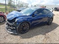 2021 Tesla Model Y — photo 2 of 17 | VIN 5YJYGDEF1MF079091