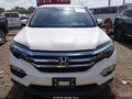 2018 Honda Pilot — photo 13 of 18 | VIN 5FNYF6H54JB029203