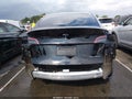 2023 Tesla Model Y — photo 6 of 19 | VIN 7SAYGDEE3PA184811