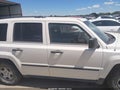 2009 Jeep Patriot — photo 13 of 16 | VIN 1J4FT28B99D206128