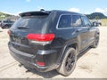 2015 Jeep Grand Cherokee — photo 4 of 11 | VIN 1C4RJFAG0FC796839
