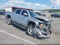 2015 GMC Sierra 1500 — photo 1 of 16 | VIN 3GTU2UEC4FG180612