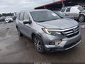 2016 Honda Pilot — photo 1 of 16 | VIN 5FNYF5H99GB044785