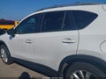 2015 Mazda CX-5 — photo 14 of 16 | VIN JM3KE4DY1F0505515