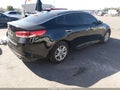 2016 Kia Optima — photo 4 of 16 | VIN 5XXGT4L34GG110058