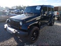 2012 Jeep Wrangler Unlimited — photo 2 of 18 | VIN 1C4BJWEG3CL169639