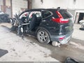 2018 Honda CR-V — photo 3 of 15 | VIN 2HKRW2H54JH699221