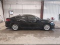 2016 Kia Optima — photo 13 of 16 | VIN 5XXGU4L33GG032577