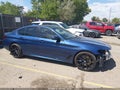 2021 BMW M550i xDrive — photo 13 of 16 | VIN WBA13BK04MCG05809