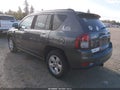2014 Jeep Compass — photo 3 of 11 | VIN 1C4NJCBAXED832388