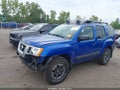 2015 Nissan Xterra — photo 2 of 18 | VIN 5N1AN0NW2FN668280