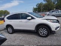 2016 Honda CR-V — photo 13 of 16 | VIN 5J6RM4H79GL051116