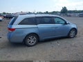 2014 Honda Odyssey — photo 13 of 16 | VIN 5FNRL5H67EB056014