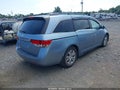 2014 Honda Odyssey — photo 4 of 16 | VIN 5FNRL5H67EB056014