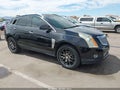 2014 Cadillac SRX — photo 1 of 11 | VIN 3GYFNDE37ES637628