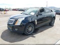 2014 Cadillac SRX — photo 2 of 11 | VIN 3GYFNDE37ES637628