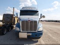 2014 Peterbilt 587 — photo 11 of 14 | VIN 1XP4DP9X3ED208824