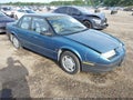 1992 Saturn Sl1 — photo 1 of 12 | VIN 1G8ZH5598NZ204045